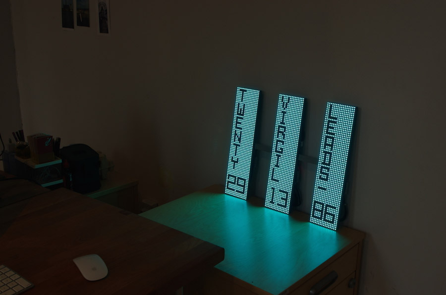 Three LittleData LED bars spelling out the word LittleData in a dark room